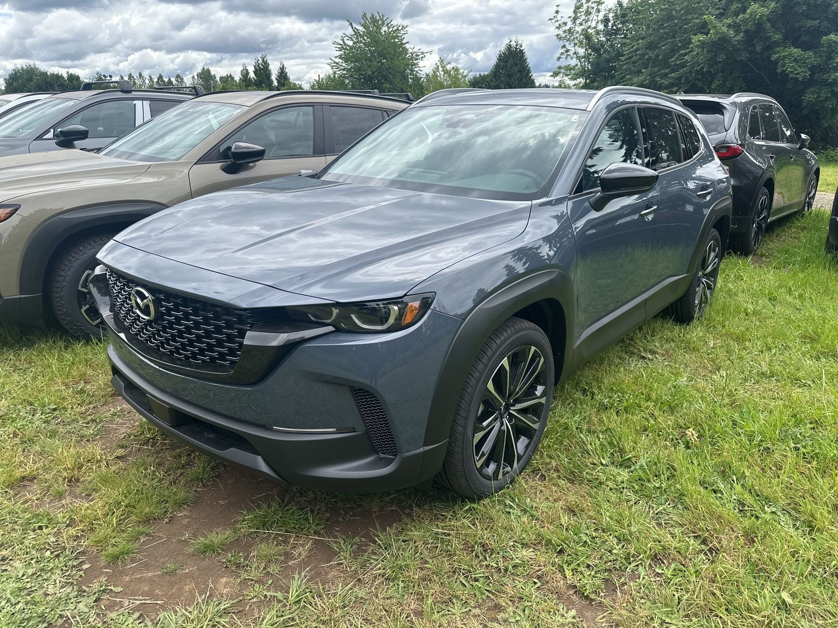2026 Mazda Mazda CX-50 2.5 S Premium AWD in Polymetal Gray Metallic — front three-quarter view