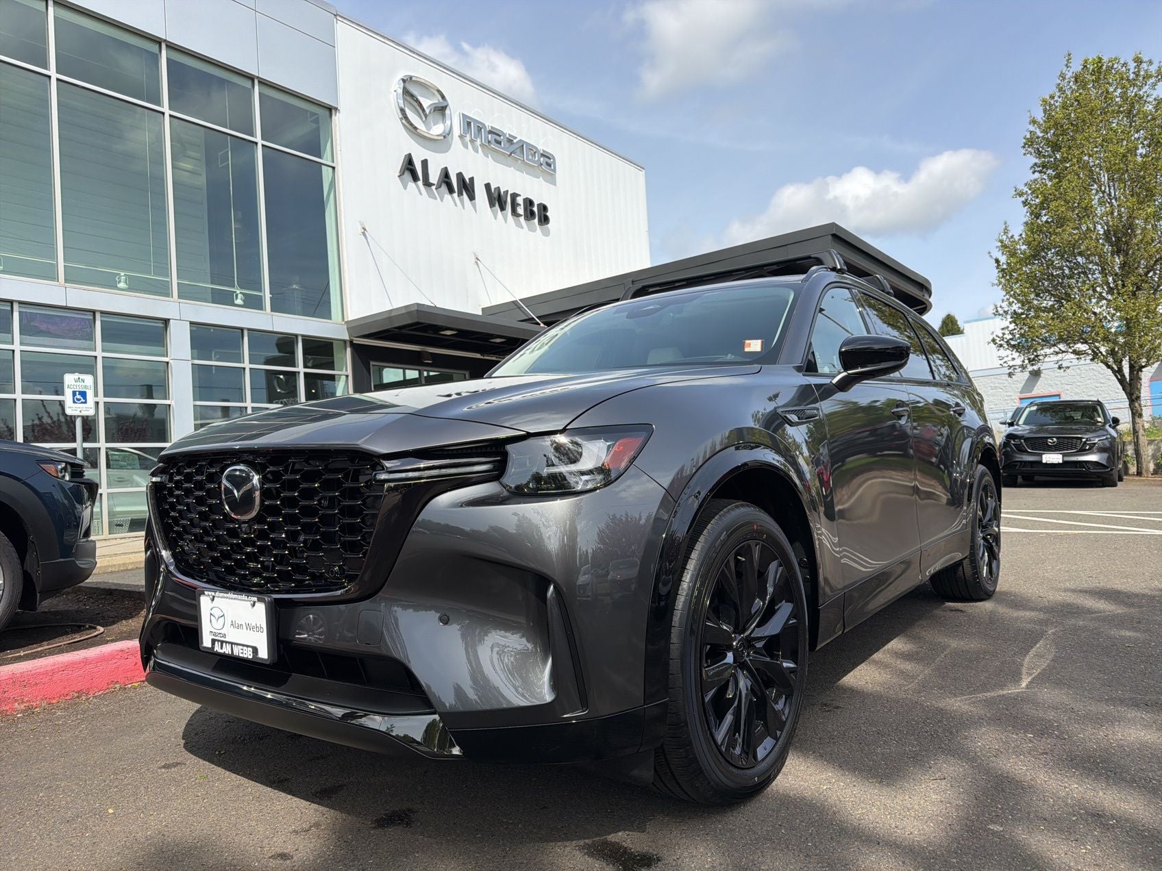 2026 Mazda Mazda CX-90 3.3 Turbo S Premium Sport AWD in Machine Gray Metallic — front three-quarter view