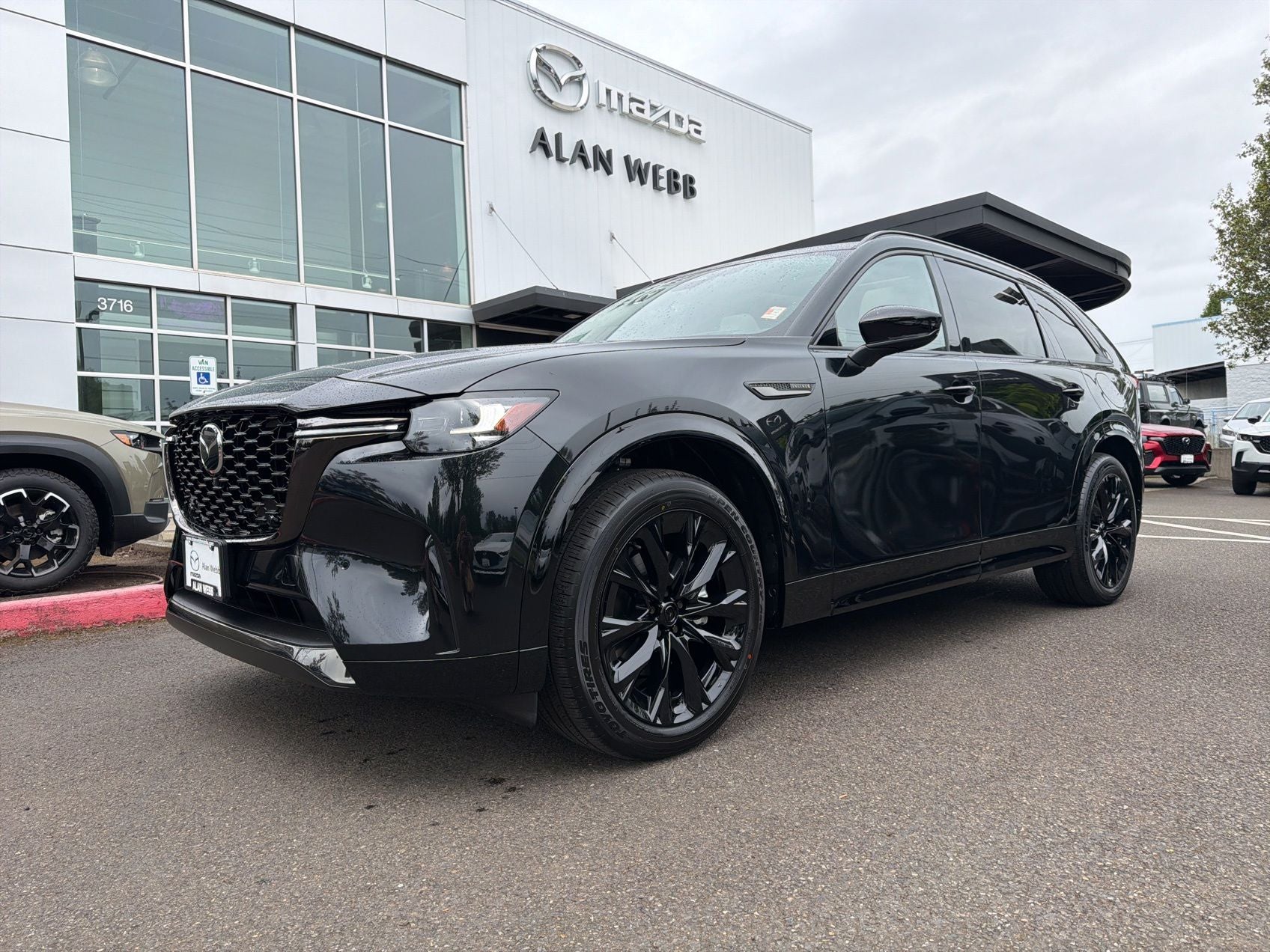 2026 Mazda Mazda CX-90 3.3 Turbo S Premium Sport AWD in Jet Black Mica — front three-quarter view