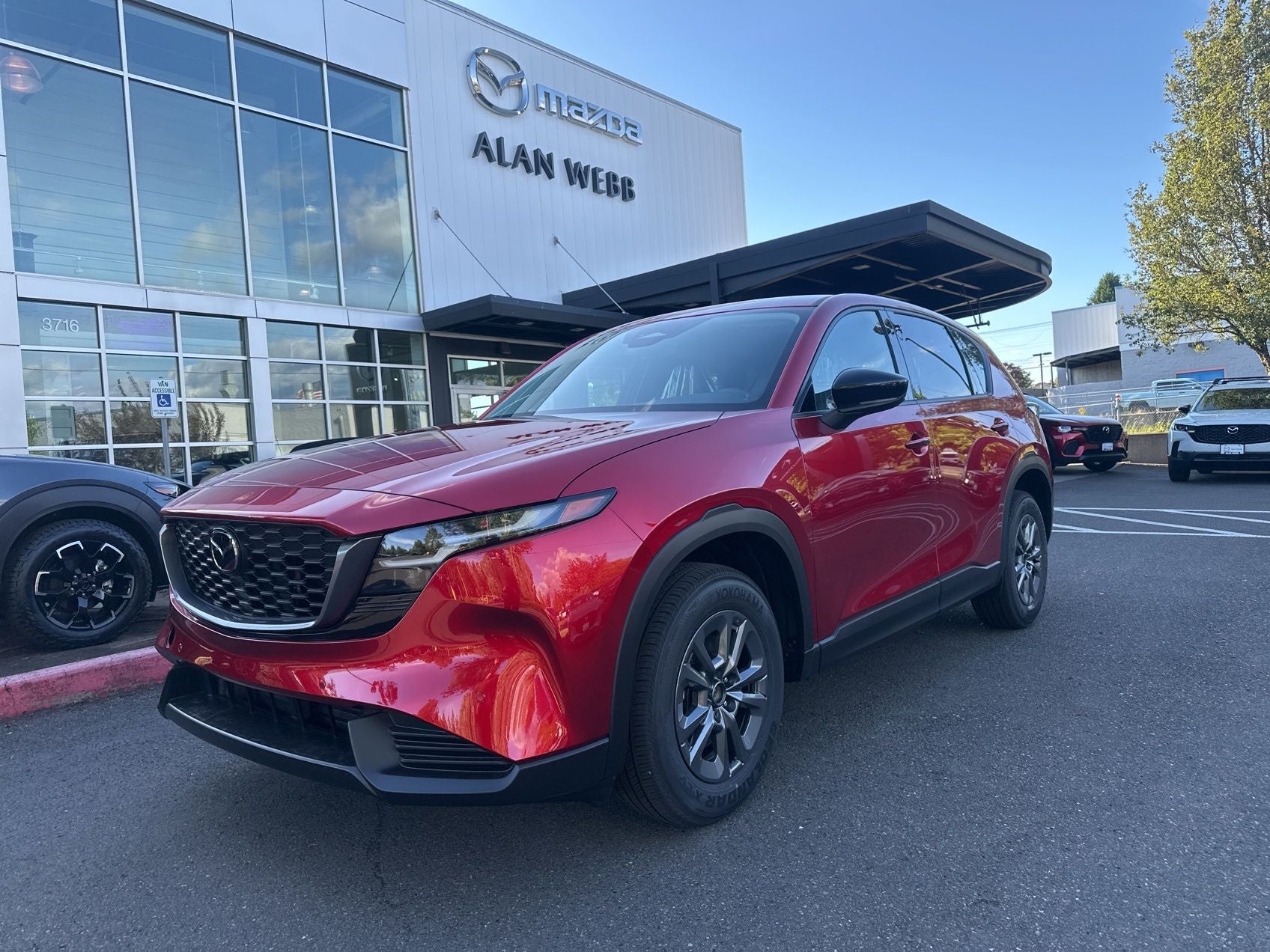 2026 Mazda Mazda CX-5 2.5 S Select AWD in Soul Red Crystal Metallic — front three-quarter view