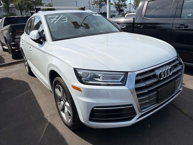 2019 Audi Q5 2.0T Premium quattro in Glacier White — front three-quarter view